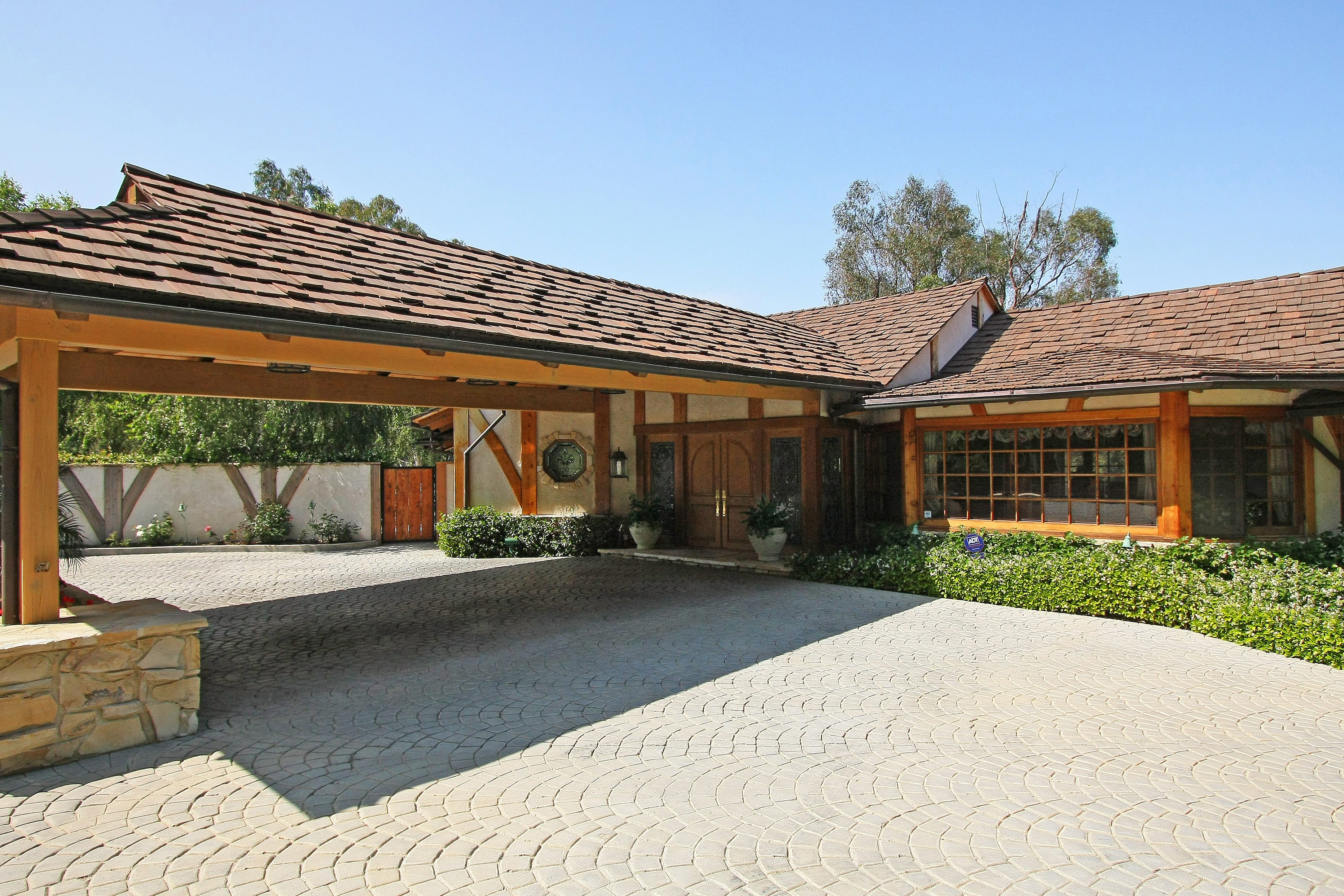 Exterior and porte-cochere of a Fryman Canyon Estates home