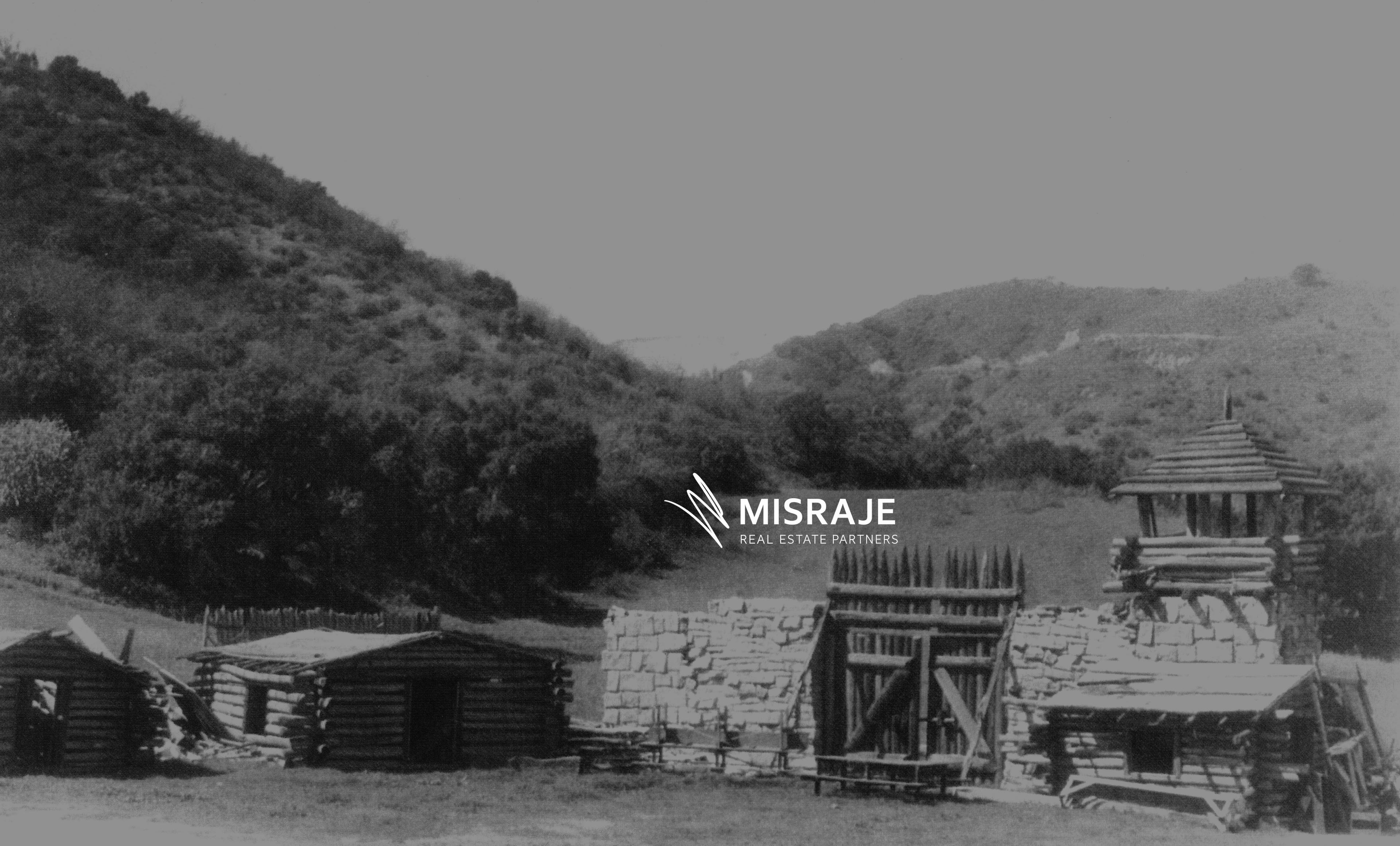 A Fryman Ranch film set, shown in original black and white and digitally colorized. Original black-and-white version.