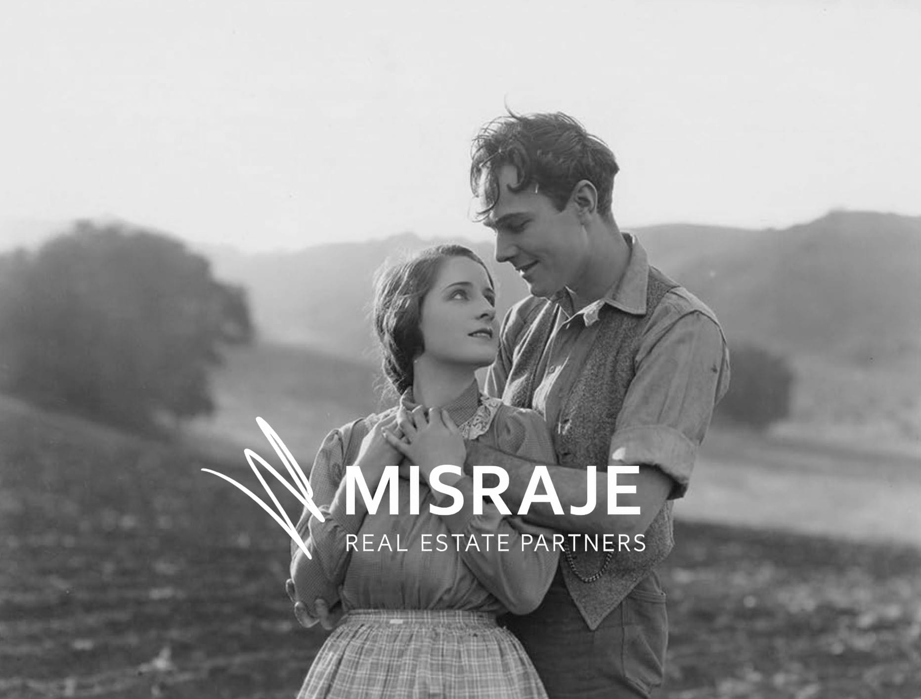 A couple embracing in a field at Fryman Ranch in a scene from Tower of Lies (1925), Studio City.