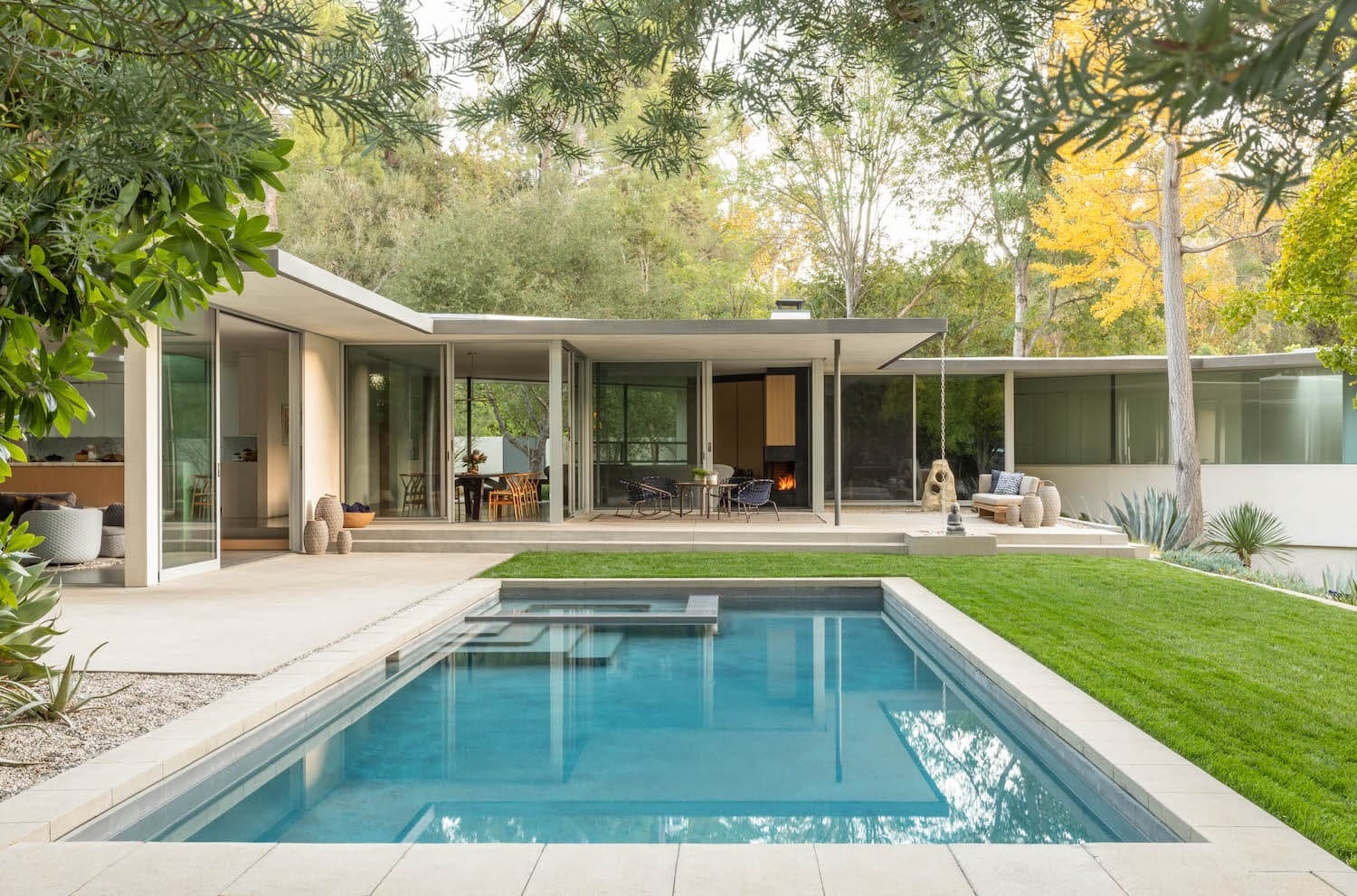 Backyard pool framed by canyon landscaping